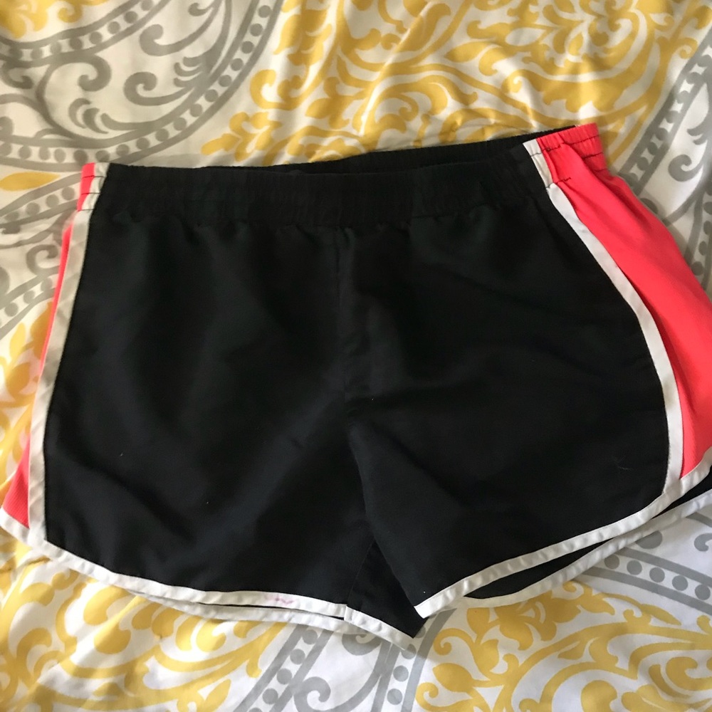 Black and pink athletic shorts